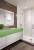 Modern home with Bath Room, Pendant Lighting, Ceramic Tile Floor, Enclosed Shower, and Mosaic Tile Wall. Bunk room bathroom Photo 4 of Mountainside Town Home