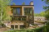 Modern home with Outdoor, Side Yard, Metal Fences, Wall, Small Patio, Porch, Deck, Stone Patio, Porch, Deck, and Wood Patio, Porch, Deck. Exterior Photo 2 of Ute Rock Residence
