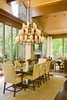 Modern home with Dining Room, Standard Layout Fireplace, Pendant Lighting, Table, Dark Hardwood Floor, and Wood Burning Fireplace. Dining Room Photo 3 of Ute Rock Residence