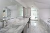 Modern home with Bath Room, Marble Counter, Drop In Sink, Drop In Tub, Enclosed Shower, Corner Shower, and Recessed Lighting. Master Bathroom Photo 6 of Historic Francis House