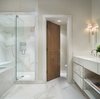 Modern home with Bath Room, One Piece Toilet, Full Shower, Drop In Sink, Pendant Lighting, Drop In Tub, Marble Counter, and Marble Floor. Guest bathroom Photo 10 of Clubside Residence