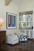 Modern home with Living Room, Dark Hardwood Floor, End Tables, and Chair. Wetbar nook Photo 2 of Clubside Residence