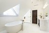 Modern home with Bath Room, Wall Lighting, Freestanding Tub, Full Shower, Marble Counter, Enclosed Shower, Corner Shower, and Drop In Sink. Master Bathroom Photo 19 of Historic Hallam