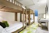 Modern home with Bedroom, Light Hardwood Floor, Chair, Wardrobe, Bunks, Bed, and Dresser. Bunkroom Photo of Historic Hallam
