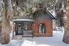 Modern home with Exterior, A-Frame RoofLine, Shingles Roof Material, House Building Type, and Brick Siding Material. Winter View Photo 6 of Historic Hallam