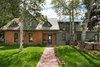Modern home with Exterior, House Building Type, Shingles Roof Material, and Brick Siding Material. Summer Exterior Photo 7 of Historic Hallam