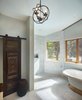 Master bathroom Photo 13 of Mad Dog Ranch modern home