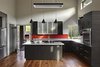 Kitchen looking out to the screen porch Photo 11 of Caney Fork Cabin modern home