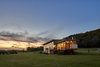 Modern home with Exterior, House Building Type, Wood Siding Material, Concrete Siding Material, and Flat RoofLine. Screen Porch Photo 8 of Caney Fork Cabin