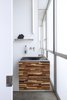 Modern home with Bath Room, Wood Counter, Drop In Sink, Concrete Floor, and Accent Lighting. This prefabricated home in California sought to minimize waste in everything from the construction process to the appliances and fixtures inside. The sink in the powder room is made from recycled tires. Photo 8 of Dawnsknoll