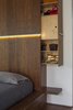 Modern home with Bedroom, Bed, and Storage. A pull-out console provides smart storage in the headboard. Photo 10 of Dawnsknoll
