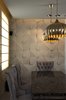 The floor area of the lounge, the dining room and the living room, is paved with“Unito” a matt finished Italian limestone with a grainy and polished texture; alone existing pillar adjacent to the family lounge was included on the main wall by re-sculpturing it into a striking wall, creating a large opening between the lounge and the dining room. Photo of Mind, Perception and Personality space modern home