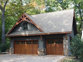 Fancy yourself as an amateur builder? The GaragePlanShop supplies blueprints to build your dream garage from scratch. This Craftsman-style garage plan with loft features three garage bays and offers 928 square feet of parking. Two bays are deep enough to accommodate boat storage. Interior stairs lead to the loft, perfect for storage or a hobby room