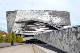 The Philharmonie de Paris, located in the Parc de La Villette, arrived amid much controversy, given that it was two-years late and three-times over budget. It consists of bird-shaped tiles that are interlocked and spread across the building's facade.