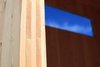 Modern home with Exterior and Wood Siding Material. The Sturgis's walls, floor and ceiling are all cross-laminated timber panels—3.25-inch thick sheets of douglas fir, manufactured in Montana and assembled at the Cubist Engineering shop. The box's air-tight construction and passive solar gain through the large windows means most climates need no additional insulation. Photo 5 of The Sturgis