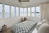 Modern home with Bedroom, Bed, and Light Hardwood Floor. The view from the tower bedroom, Boston in the distance. Photo 5 of The Lighthouse