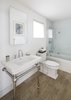 Modern home with Bath Room, Porcelain Tile Floor, Pedestal Sink, Enclosed Shower, Alcove Tub, and Two Piece Toilet. Clean and simple bathroom. Photo 7 of The Lighthouse