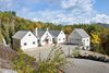 Exterior Photo of Contemporary Timber Frame Home Overlooking Twin Waterfalls modern home