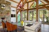 Open floor plan allows for plentiful light, unparalleled views. Hand-carved, handcrafted timbers. Photo 7 of Contemporary Timber Frame Home Overlooking Twin Waterfalls modern home