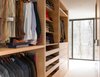 Open walk-in closet Photo 16 of House in the Woods modern home