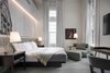 Modern home with Bedroom. King Guest Room Photo 4 of Hotel Henry Urban Resort at Richardson Olmsted Campus