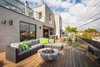 Modern home with Outdoor, Back Yard, Shrubs, Large Patio, Porch, Deck, Landscape Lighting, and Decking Patio, Porch, Deck. Deck with fire pit. Photo 4 of The Abernathy