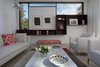 Modern home with Living Room, Sofa, Coffee Tables, Chair, Bench, Floor Lighting, and Light Hardwood Floor. Living Room Photo 2 of The Hearn House