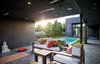 Modern home with Outdoor, Back Yard, Trees, Large Pools, Tubs, Shower, and Concrete Patio, Porch, Deck. The Wave House by Mario Romano featuring Infratech Flush Mount WD-Series Dual Element Heaters Photo 2 of The Wave House by Mario Romano