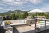 A rooftop deck provides 360-degree views of the Boulder Flatirons and the entire front range. Photo 9 of Sunset House modern home