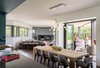 The healthy communion between nature and structure is what the family loves most about the home. It is open, dramatic, light, and inviting, which is everything the clients wanted in a new house. The transition between what’s beyond the windows and what’s within is appealingly effortless, and entirely in keeping with a laid-back Colorado lifestyle. Photo 2 of Sunset House modern home
