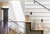 A stairway lit by a hidden skylight leads the way towards the lower level. Photo 6 of Modern Golf Course Home modern home