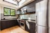 Clean Kitchen with Reclaimed Steel Backsplash Photo 5 of Reclaimed Malibu Modern modern home