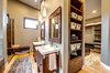 The master bath and closet continue Ascent's circulation theme. Photo 19 of Ascent Estes Park modern home