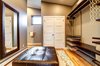 The master closet offers plenty of circulation space and natural light. Photo 16 of Ascent Estes Park modern home