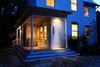 Modern home with Exterior, Farmhouse Building Type, House Building Type, Metal Roof Material, and Gable RoofLine. The home is entered from the street-facing front porch with an unexpected side-entry. Photo 2 of Urban Farmhouse
