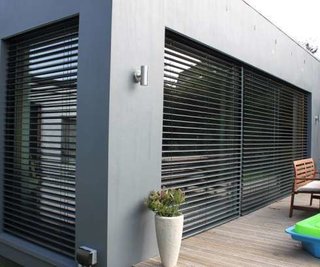 Bergmark Architects renovated this bungalow in Edinburgh in 2015, extending the structure into the backyard and providing an open concept kitchen, living, and dining area. 