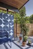 Modern home with Outdoor, Small Patio, Porch, Deck, Wire Fences, Wall, Back Yard, Tile Patio, Porch, Deck, Trees, Pavers Patio, Porch, Deck, Wood Fences, Wall, Horizontal Fences, Wall, Raised Planters, Shrubs, Hardscapes, Post Lighting, Metal Fences, Wall, Planters Patio, Porch, Deck, Walkways, and Decomposed Granite Patio, Porch, Deck. Re-Open House by Matt Fajkus Architecture | Photo by Charles Davis Smith Photo 10 of Re-Open House