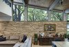 Modern home with Living Room, Chair, Console Tables, Storage, Sofa, Concrete Floor, Recessed Lighting, and Pendant Lighting. Re-Open House by Matt Fajkus Architecture | Photo by Charles Davis Smith Photo 16 of Re-Open House