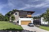 Modern home with Exterior, Metal Siding Material, Brick Siding Material, Stucco Siding Material, House Building Type, Metal Roof Material, Wood Siding Material, and Saltbox RoofLine. Overall, the design strove to preserve some of the character of the original front facade while allowing a contemporary structure to unfold. Photo 18 of Mullet House