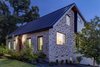 Modern home with Exterior, Wood Siding Material, Metal Roof Material, House Building Type, Stucco Siding Material, Metal Siding Material, and Brick Siding Material. Mullet House by Matt Fajkus Architecture | Photo by Charles Davis Smith Photo 19 of Mullet House