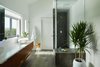 Modern home with Engineered Quartz Counter, Recessed Lighting, Dark Hardwood Floor, and Ceiling Lighting. Via Media Residence by Matt Fajkus Architecture | Photo by Leonid Furmansky Photo 14 of Via Media Residence