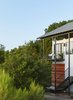 Modern home with Exterior, Metal Roof Material, Wood Siding Material, Stucco Siding Material, and House Building Type. Via Media Residence by Matt Fajkus Architecture | Photo by Leonid Furmansky Photo 4 of Via Media Residence