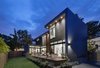 Modern home with Exterior, House Building Type, Metal Siding Material, Metal Roof Material, Flat RoofLine, Stucco Siding Material, and Wood Siding Material. Add/Subtract House by Matt Fajkus Architecture | Photo by Charles Davis Smith Photo 2 of Add/Subtract House