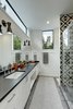 Modern home with Bath Room, Ceramic Tile Floor, Engineered Quartz Counter, Enclosed Shower, Recessed Lighting, Drop In Sink, and One Piece Toilet. Add/Subtract House by Matt Fajkus Architecture | Photo by Charles Davis Smith Photo 8 of Add/Subtract House