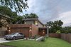 Modern home with Exterior, Metal Roof Material, Wood Siding Material, Metal Siding Material, House Building Type, Flat RoofLine, and Stucco Siding Material. Add/Subtract House by Matt Fajkus Architecture | Photo by Charles Davis Smith Photo 12 of Add/Subtract House