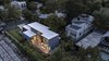Modern home with Exterior, House Building Type, Wood Siding Material, Stucco Siding Material, Flat RoofLine, Metal Siding Material, and Metal Roof Material. Add/Subtract House by Matt Fajkus Architecture | Photo by Charles Davis Smith Photo 11 of Add/Subtract House