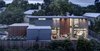 Modern home with Exterior, Flat RoofLine, Metal Roof Material, House Building Type, Wood Siding Material, Stucco Siding Material, and Metal Siding Material. Add/Subtract House by Matt Fajkus Architecture | Photo by Charles Davis Smith Photo 9 of Add/Subtract House