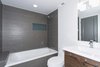 All baths have been updated with new horizontal straight lay tile with convenient storage nooks. Photo 7 of King of the Wasatch modern home