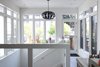 Stairwell leading to the lower level of this remodeled two-story Cow Hollow home Photo 4 of San Francisco, Cow Hollow Remodel modern home