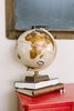 Modern home with Office, Craft Room Room Type, and Desk. A vintage globe is a nod to the love of traveling found within the homeowners. Photo 2 of Going Old School in The Bay Area